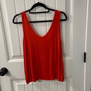 Cabi Busy Tank color geranium, size large.  Very gently used.  Looks brand new.